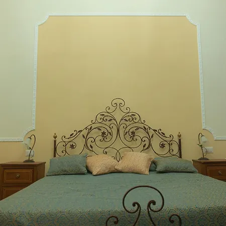 Quarto em Acomodações Particulares Palazzo Capece Caivano