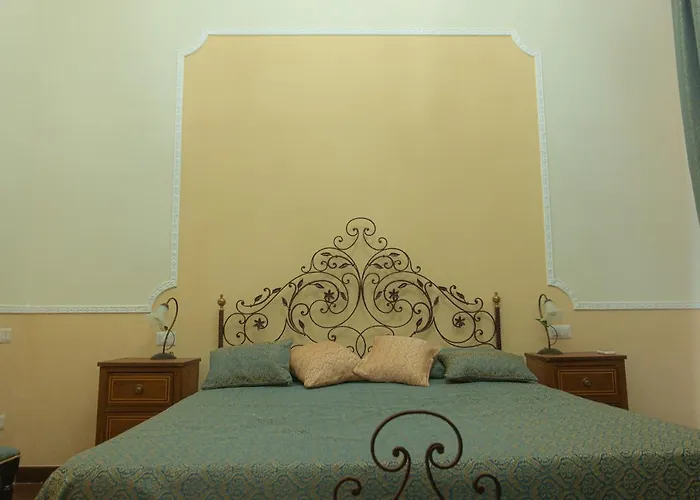 Quarto em Acomodações Particulares Palazzo Capece Caivano